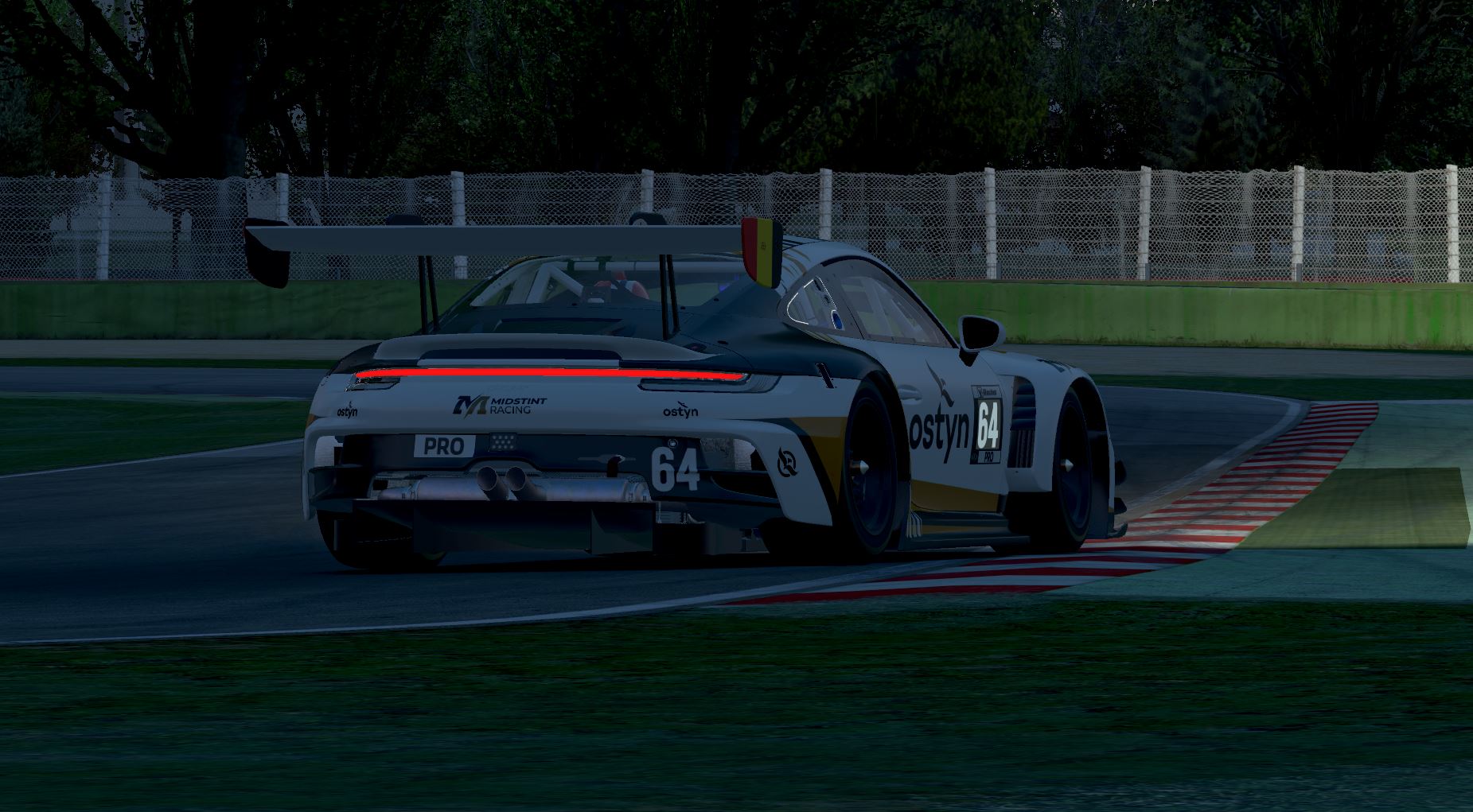 Midstint Racing Porsche 911 GT3 R rear view in corner with brake lights glowing